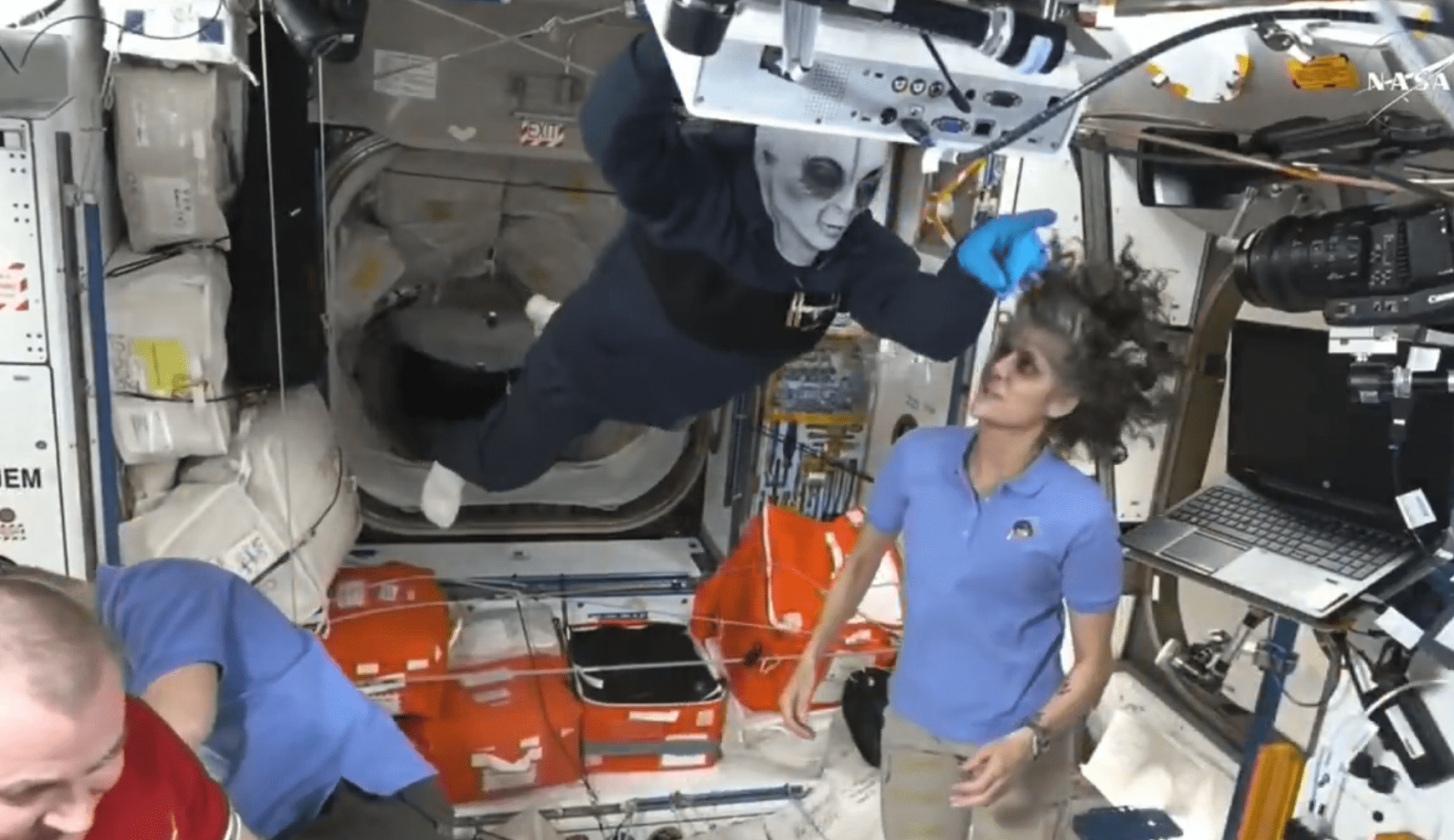 Bizarre moment ‘alien’ greets SpaceX crew as they dock at International Space Station to rescue stranded astronauts